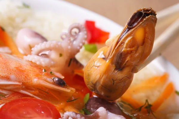 Mussel without shell close up in Asian soup — Stock Photo, Image