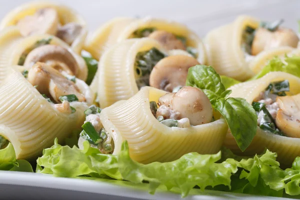 Lumakoni Italian pasta stuffed  mushrooms, cheese and spinach — Stock Photo, Image