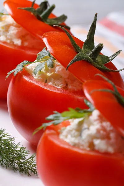 Appetizer of fresh tomatoes stuffed with cheese vertical — Stock Photo, Image