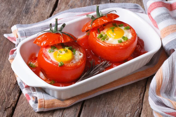 Baked tomatoes stuffed with egg — Stock Photo, Image