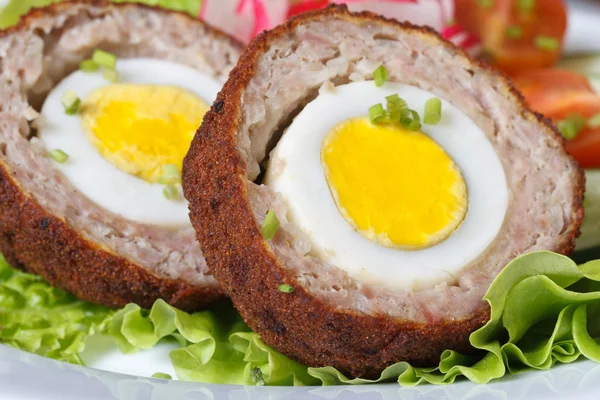 Healthy breakfast of meat stuffed egg on the lettuce — Stock Photo, Image