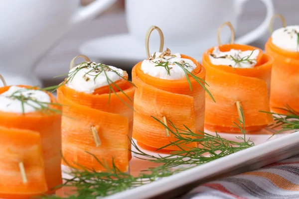 Appetizer of fresh carrot rolls with cream cheese — Stock Photo, Image