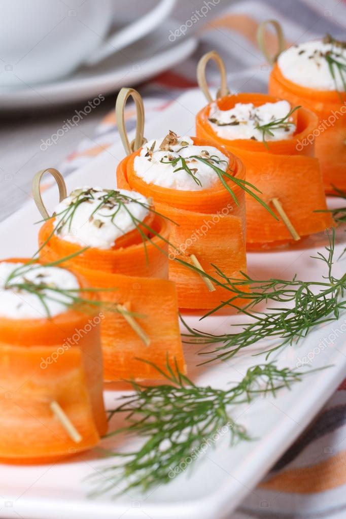 carrot rolls stuffed with soft cheese and dill 