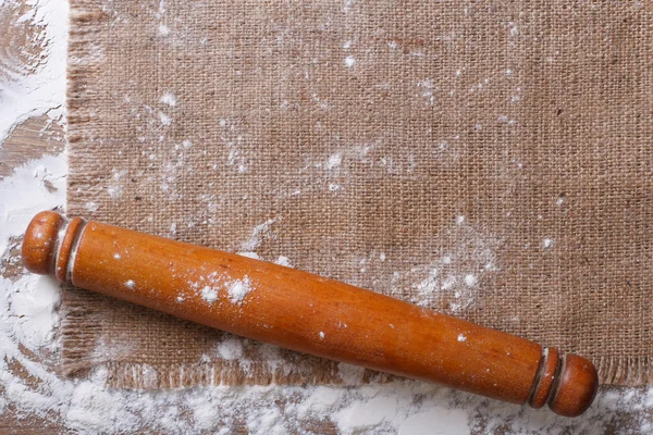 Rolling pin on sackcloth and flour horizontal — Stock Photo, Image