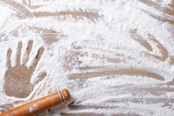 Imprint on palm flour and rolling pin horizontal — Stock Photo, Image