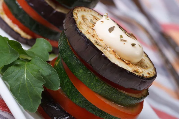 Eggplant, zucchini and tomatoes with arugula — Stock Photo, Image