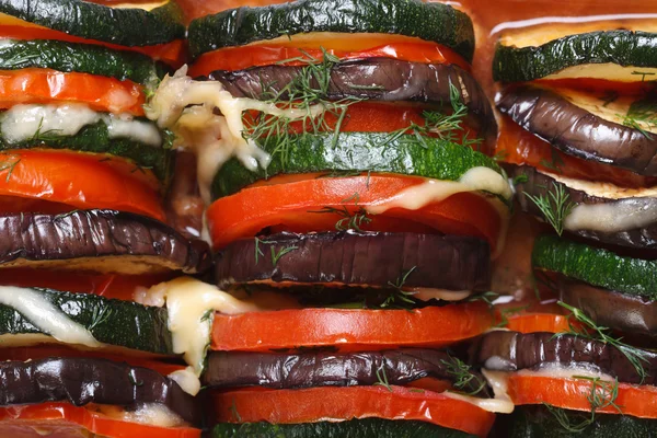Background of eggplant, zucchini and tomatoes baked — Stock Photo, Image