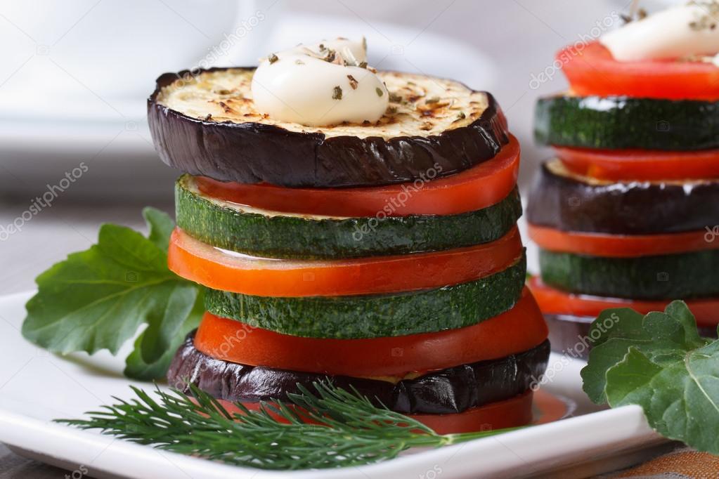 vegetarian appetizer of roasted vegetables with sauce