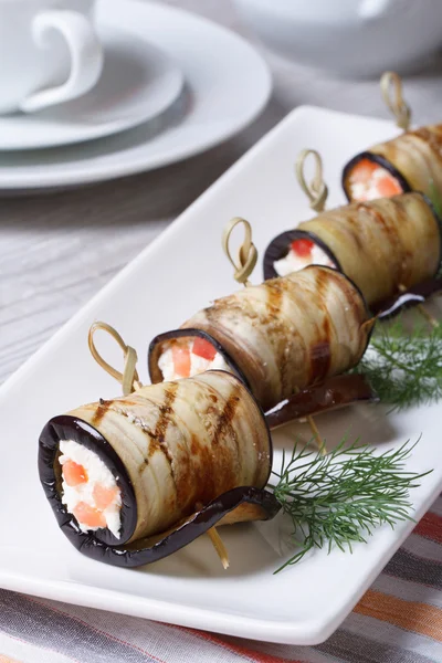 Eggplant rolls with cream cheese and tomatoes vertical — Stock Photo, Image