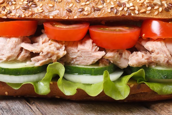 Delicious sandwich with tuna and vegetables macro. horizontal — Stock Photo, Image