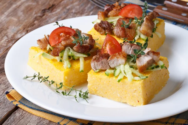 Slices of tasty polenta with meat and vegetables — Stock Photo, Image
