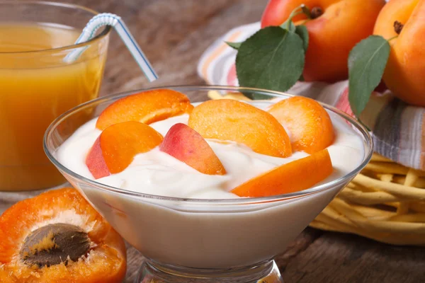 Apricot yoghurt and fresh juice closeup horizontal — Stock Photo, Image