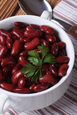 cooked red kidney beans with parsley vertical view from above clipart
