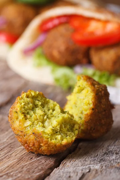 Falafel macro against the background of pita bread vertical — Stock Photo, Image