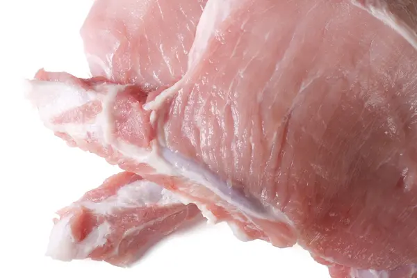 Dos trozos de carne cruda carne de cerdo primer plano aislado —  Fotos de Stock