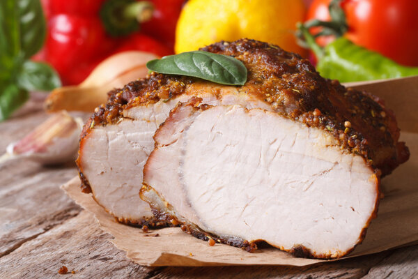 Tasty juicy roast pork tenderloin and fresh vegetables
