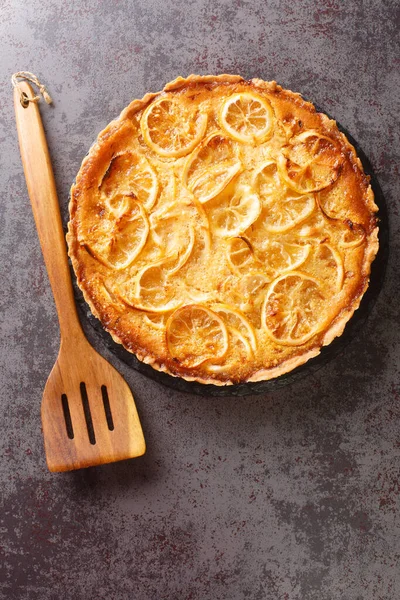 Traditional savory pie kurnik with chicken, potatoes and rice. Homemade  baking. Vertical view Stock Photo