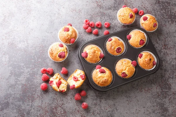 Freshly Baked Muffins Raspberries White Chocolate Close Muffin Pan Table — Foto Stock