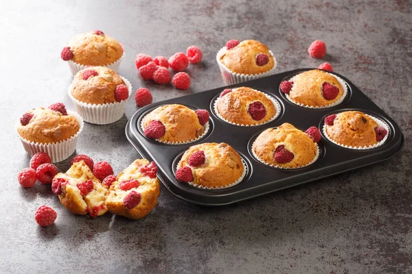 Freshly Baked Muffins Raspberries White Chocolate Close Muffin Pan Table — Stok fotoğraf