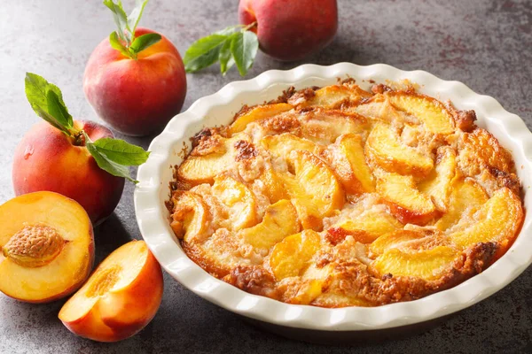 Oven Baked Perfect Southern Dessert Peach Cobbler Concrete Gray Background — стоковое фото