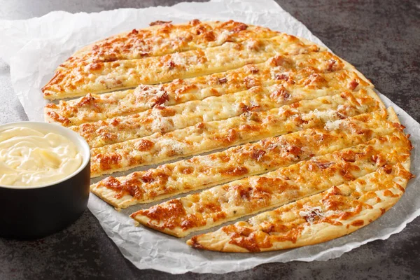 Canadian Pizza Garlic Fingers Donair Sauce Close Paper Table Horizonta — Foto Stock