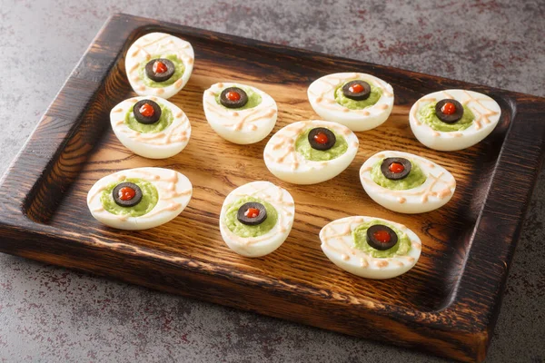 Monster Eyes Deviled Eggs Avocado Olives Halloween Day Wooden Tray — Stock Photo, Image