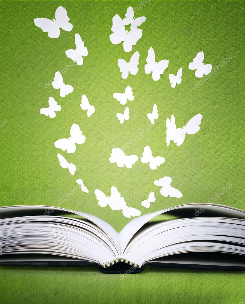 Opened book and butterflies