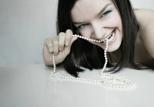 Woman and pearl — Stock Photo, Image