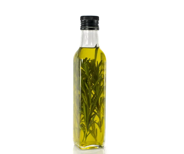 Bottle olive oil with oregano — Stock Photo, Image