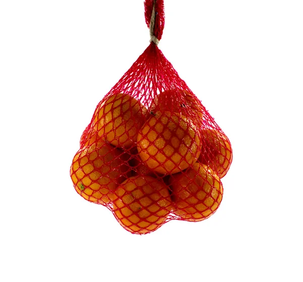 Red net with mandarines — Stock Photo, Image