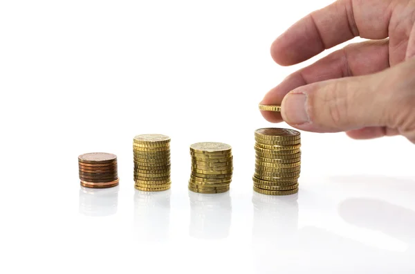 Hands and table with coins Royalty Free Stock Photos