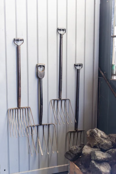 Old pitcfork used to put coal in the steamoven — Stock Photo, Image