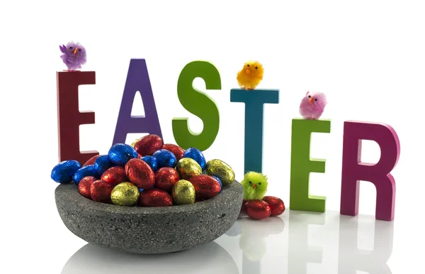 Concrete dish with easter eggs — Stock Photo, Image