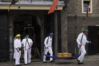 Alkmaar,holland,26-07-2022:Cheese auction on the market in Alkmaar, Netherlands. This traditional spectacle is every friday in summer and you can always find a lot of tourists
