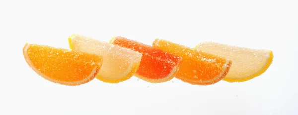 Segments of citrus fruit jelly. — Stock Photo, Image