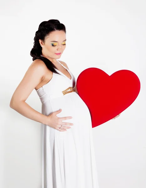 Pregnant woman in studio — Stock Photo, Image