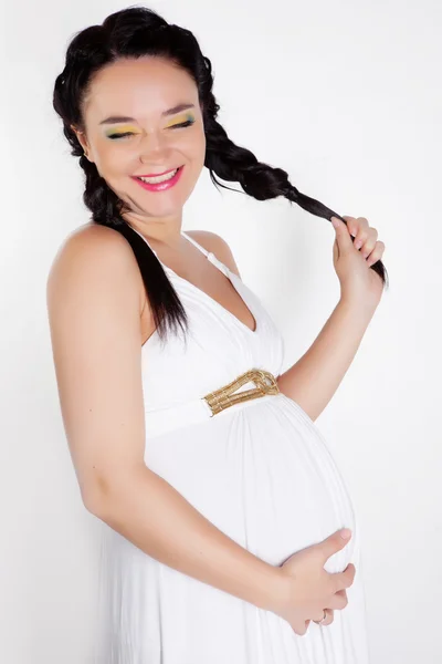 Pregnant woman in studio — Stock Photo, Image