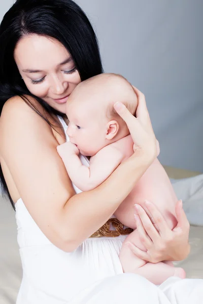 Mother with newborn sun — Stock Photo, Image