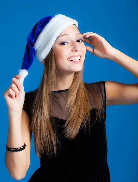 Girl in christmas hat — Stock Photo, Image