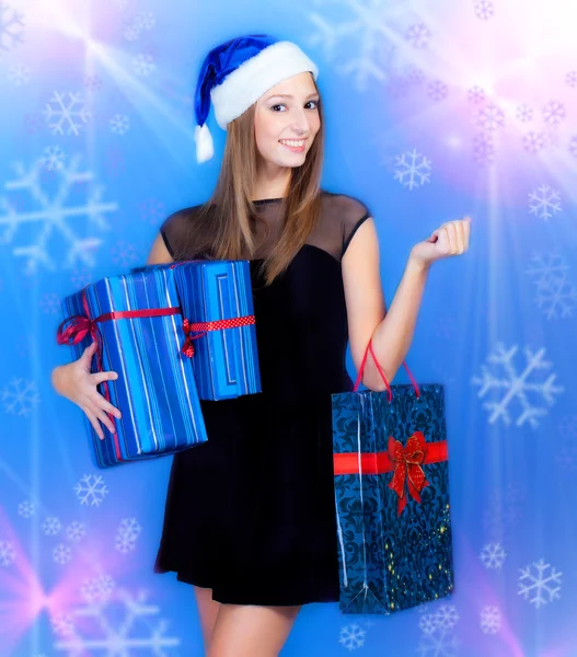 Girl with christmas presents — Stock Photo, Image