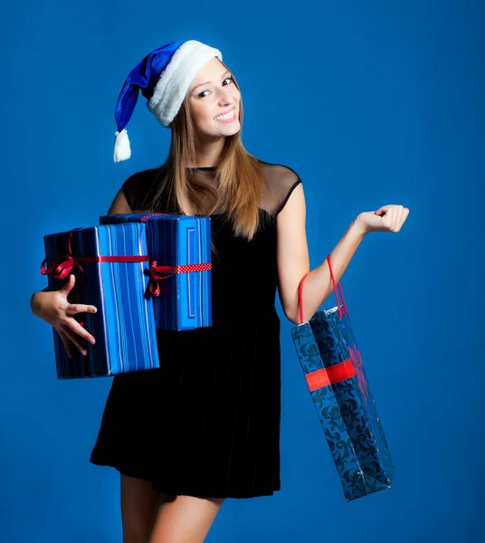 Girl with christmas presents — Stock Photo, Image