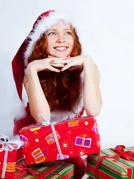 Redhead girl with presents — Stock Photo, Image
