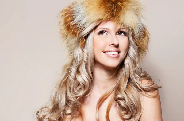 Girl in fur hat — Stock Photo, Image