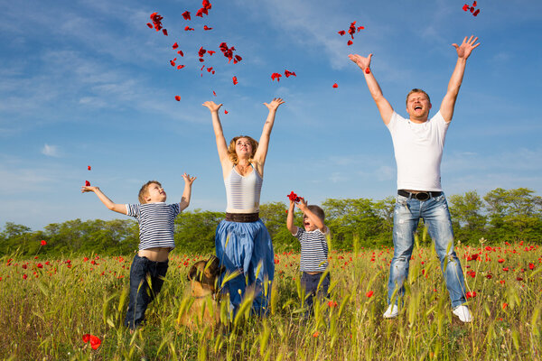 Family on the poppy meadow