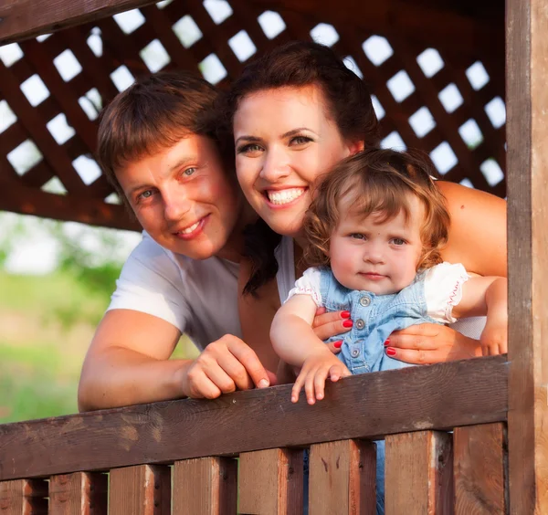 Family in bower — Stock Photo, Image