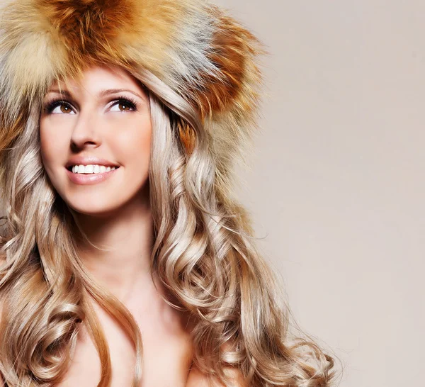 Girl in fur hat — Stock Photo, Image