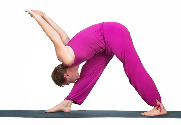 Man making yoga figure — Stock Photo, Image