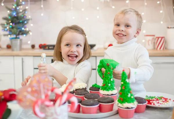 Little Children Prepare Christmas Treat White Kitchen Boy Girl Dressed — Stock Photo, Image