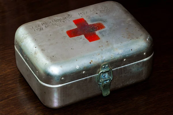 Retro iron first aid box in the dark