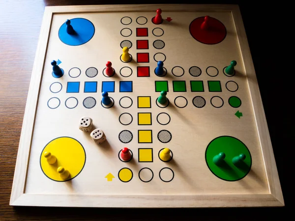 Playing Ludo Game Wooden Table — Stockfoto